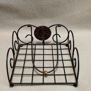 Napkin Holder-Decorative rustic bronze metal scrolls & weighted pivoting arm.